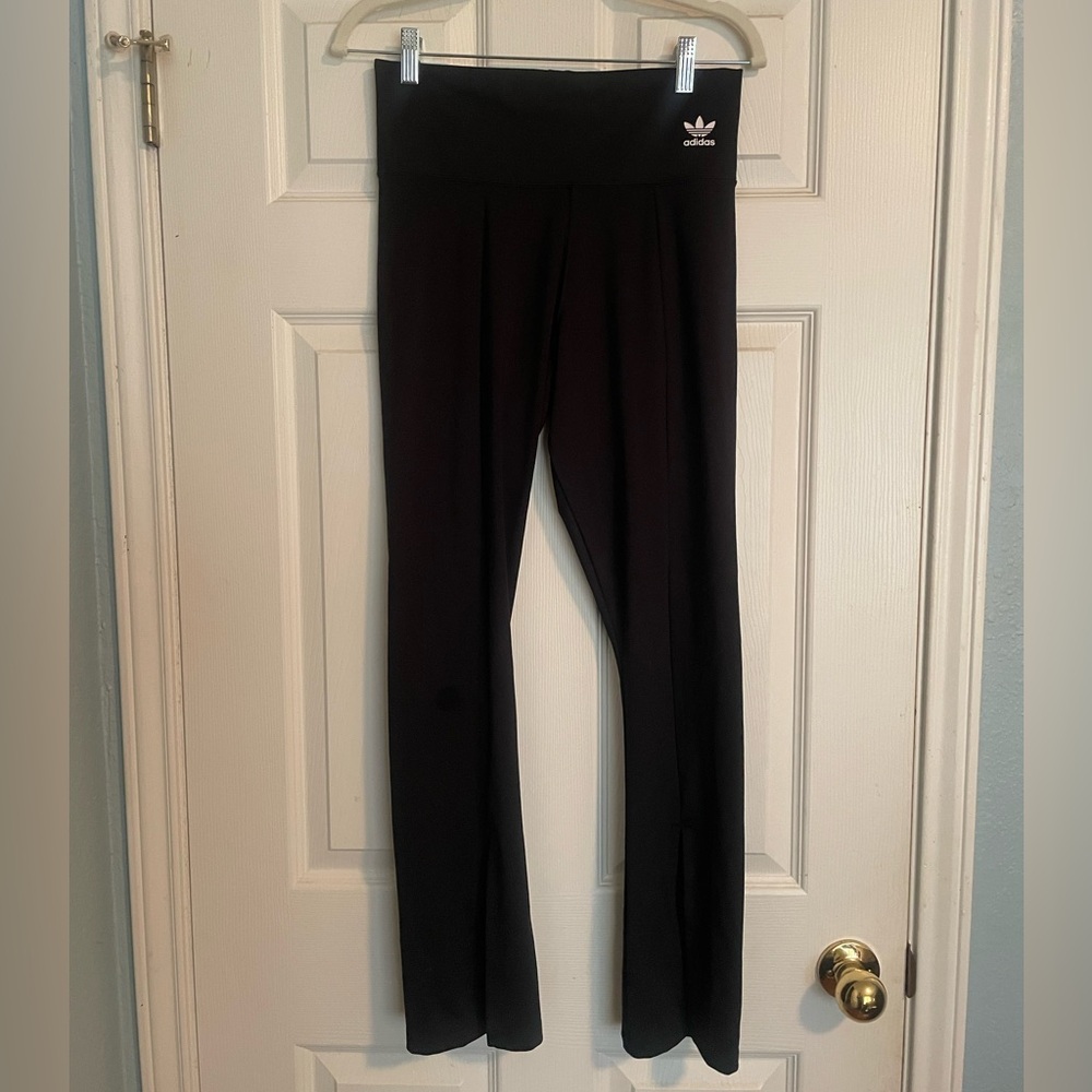 Adidas Black Leggings with seam and slit in the front for fun movement!